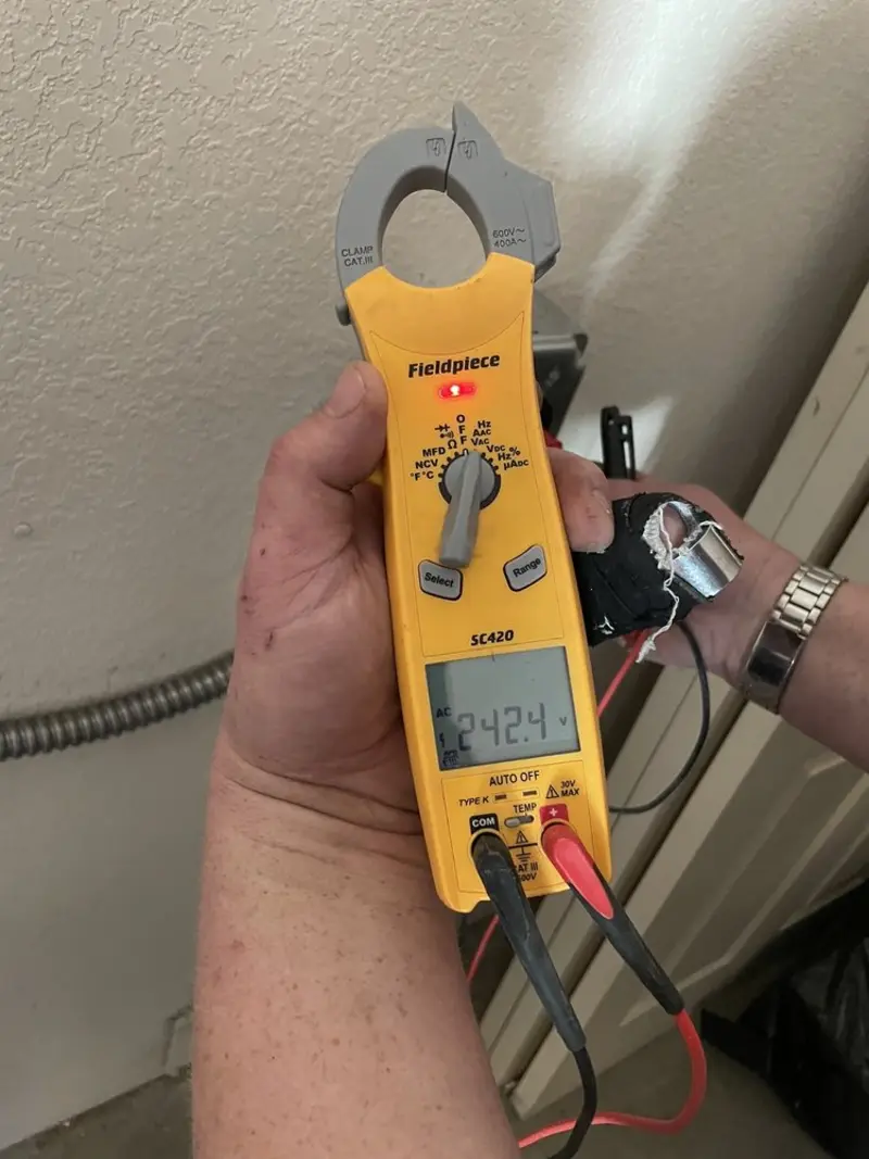 Voltage testing with clamp meter during Aluminum Wiring Replacement in Montgomery